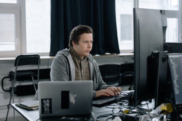 guy at a computer desk